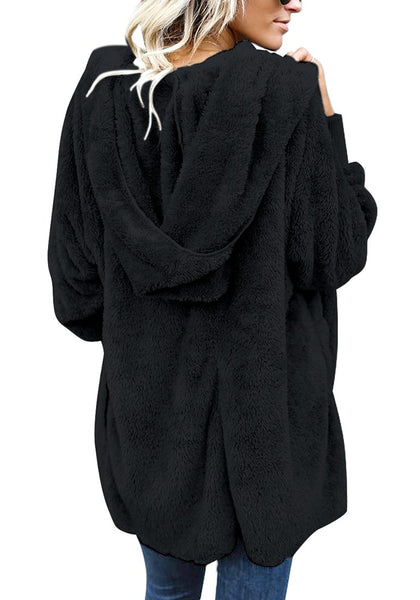 Back view of model wearing black snuggle fleece oversized hooded cardigan-min