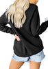 Back view of model wearing black statement print crewneck sweatshirt