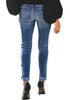 Back view of model wearing blue mid-waist raw hem  cropped ripped denim jeans