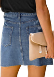Back view of model wearing dark blue raw hem distressed denim mini skirt