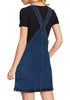Back view of model wearing dark blue side pockets overall denim pinafore dress