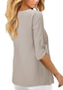 Back view of model wearing grey V-neckline 34 cuffed sleeves button-up loose top