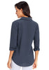 Back view of model wearing navy blue long cuffed sleeves lapel button-up blouse