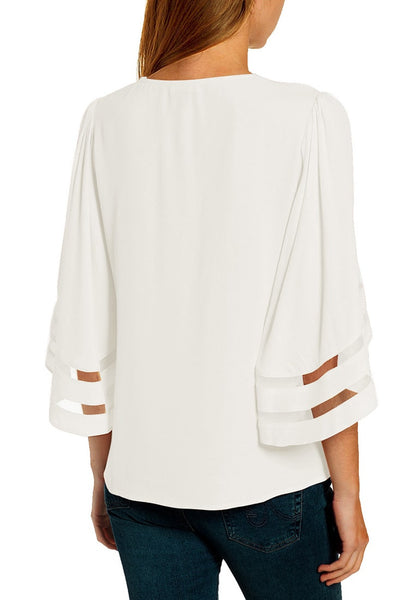 Front view of model wearing white 34 bell mesh panel sleeves V-neckline loose top