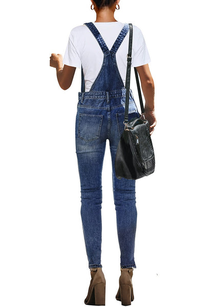 Back view of modell wearing dark blue ripped skinny jeans denim bib overall