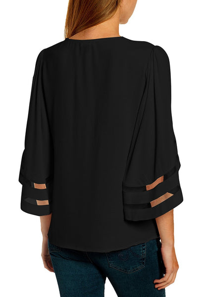 Back view of model wearing black 34 bell mesh panel sleeves V-neckline embroidered top