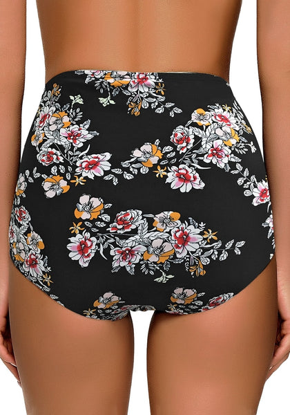 Back view of model wearing black floral-print high waist ruched swim bottom