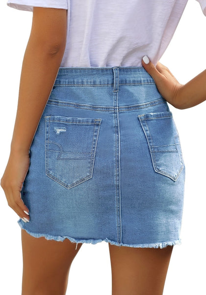 Back view of model wearing light blue distressed frayed hem denim mini skirt
