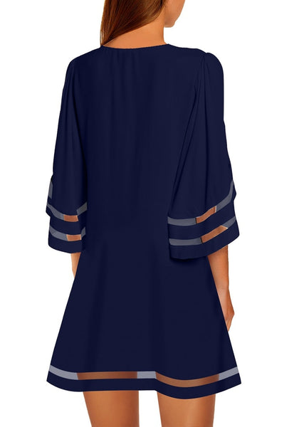 Back view of model wearing navy blue 3-4 bell sleeves mesh panel crew-neckline loose dress