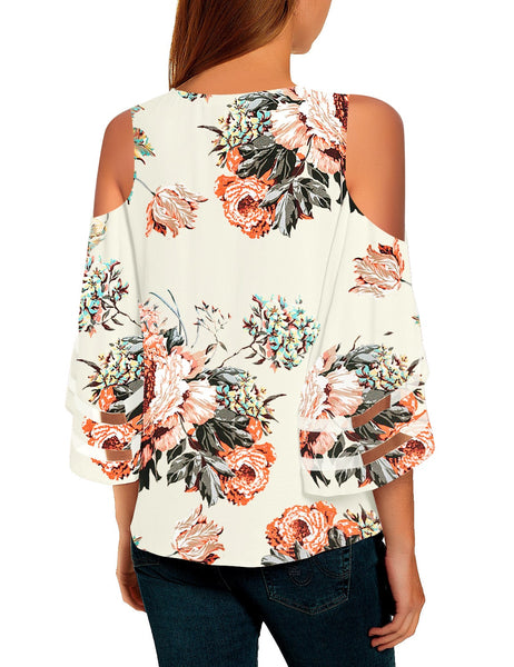 Back view of model wearing off-white 3-4 bell mesh panel sleeves cold-shoulder loose floral top