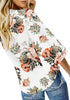 Back view of model wearing white V-neckline button-up tie-front floral top