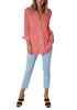 Front full body shot of model wearing coral long cuffed sleeves lapel button-up blouse