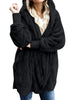 Front view of model in black snuggle fleece oversized hooded cardigan-min