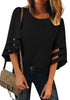 Front view of model wearing black 34 bell mesh panel sleeves crew neck loose top