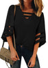 Front view of model wearing black 34 bell mesh panel sleeves strappy V-neckline loose top