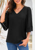 Front view of model wearing black V-neckline crochet lace trim sleeves loose blouse