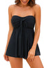 Front view of model wearing black bow knot-front sweetheart swing tankini set as bandeau tankini set