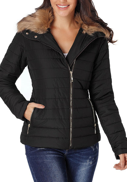 Front view of model wearing black faux fur collar zip up quilted jacket