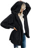 Front view of model wearing black snuggle fleece oversized hooded cardigan-min