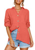 Front view of model wearing coral collared V-neckline cuffed sleeves button-up top