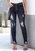 Front view of model wearing dark blue high-rise ripped buttoned denim jeans