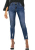 Front view of model wearing dark blue mid-waist raw hem  cropped ripped denim jeans