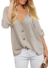 Front view of model wearing grey V-neckline 34 cuffed sleeves button-up loose top