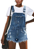 Front view of model wearing light blue frayed raw hem denim shorts overall