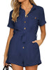 Front view of model wearing navy blue short sleeves button-down belted romper