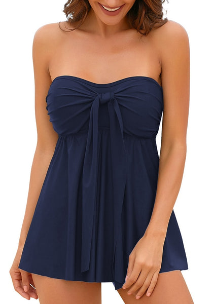 Front view of model wearing navy bow knot-front sweetheart swing tankini set as bandeau tankini set
