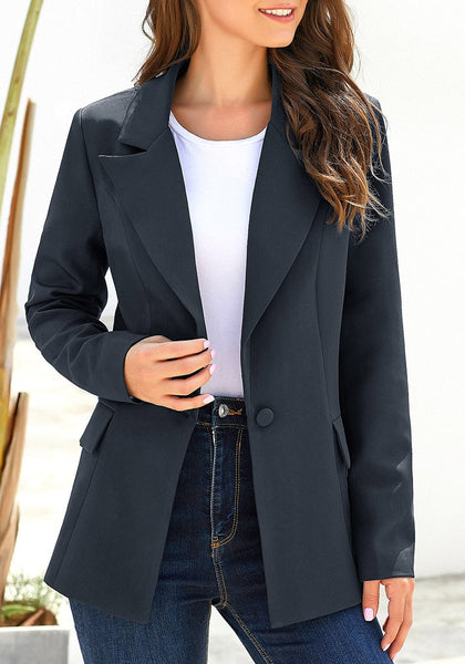 Front view of model wearing navy lapel front-button side-pockets blazer