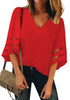 Front view of model wearing red 3/4 bell mesh panel sleeves V-neckline loose top