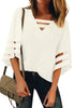 Front view of model wearing white 34 bell mesh panel sleeves strappy V-neckline loose top