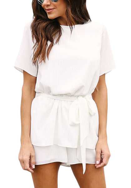 Front view of model wearing white short sleeves keyhole-back belted romper