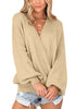 Front view of woman wearing apricot lantern sleeves surplice sweater