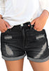 Front view of model wearing black roll-over hem ripped denim shorts