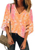 Front view of model wearing coral & pink 3-4 bell mesh panel sleeves V-neck tie-dye top