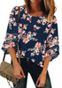 Front view of model wearing dark blue 3-4 bell mesh panel sleeves crew neck floral loose top.