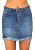 Front view of model wearing dark blue frayed raw hem buttons denim mini skirt