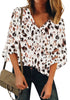 Front view of model wearing white 34 mesh panel sleeves V-neckline abstract-print top
