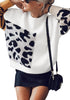 Front view of model wearing white animal-print colorblock batwing sleeves sweater