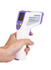 Holding on digital infrared forehead fever thermometer