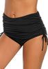 Left angled view of model wearing black side-drawstring high waist ruched bikini bottom