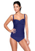 Model poses wearing blue ruched tankini set