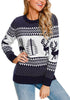 Model poses wearing navy reindeer and tree ugly Christmas sweater