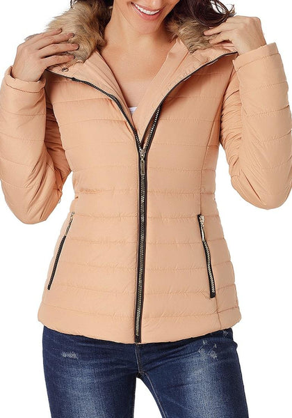 Model poses wearing peach faux fur collar zip up quilted jacket