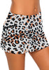 Model poses wearing leopard print zipper-pocket waistband skirted bikini bottom