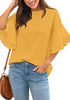 Model poses wearing mustard yellow trumpet sleeves keyhole-back blouse