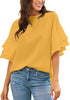 Model wearing mustard yellow trumpet sleeves keyhole-back blouse