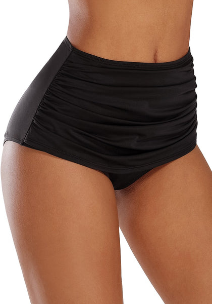 Right angled shot of model wearing black high waist ruched swim bottom